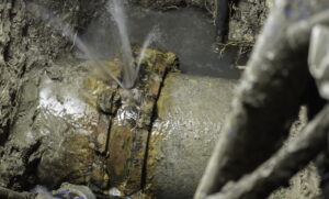 Couple of asbestos cement water pipe broken, 300 mm diameter class 25, over 20 years